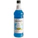 A blue Monin bottle of cotton candy syrup with a blue label.