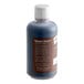A blue bottle of Nielsen-Massey Pure Vanilla Paste with a white cap.