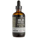 A bottle of 18.21 Barrel Aged Havana & Hide Bitters with a dropper.