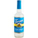 A 750 mL glass bottle of Torani Sugar-Free Coconut Flavoring Syrup with a blue label.