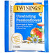 A blue and white Twinings packet of Unwind Passionflower & Chamomile, Spiced Apple & Vanilla Herbal Tea.