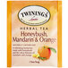 A package of Twinings Honeybush, Mandarin & Orange tea bags with text on it.