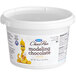 A white tub of Satin Ice ChocoPan yellow modeling chocolate.