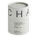 A cylindrical tin of Dona Ceremonial Grade Matcha powder.
