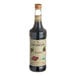 A Monin bottle of Organic Chocolate Flavoring Syrup.