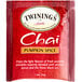 A red Twinings pumpkin spice chai tea bag.