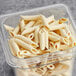 A plastic container of Seviroli par-cooked penne pasta.