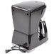 A black Proctor Silex coffee maker with a cord.