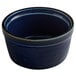 An Azora Blue porcelain ramekin with a black rim.