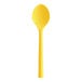 A yellow plastic spoon with a handle.