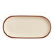 An Acopa Keystone white porcelain oblong platter with a brown border.