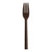 A brown polycarbonate fork with a white background.