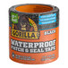 A roll of Gorilla Waterproof Patch & Seal utility tape with water droplets on it.