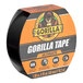 A roll of Gorilla black ultimate tape with a gorilla logo on the label.