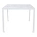 A white rectangular BFM Seating table with a marble top.