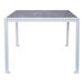 A BFM Seating white aluminum table with a Pietro top.