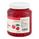 A large plastic jar of maraschino cherries with stems.