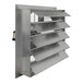 A stainless steel Canarm shutter-mounted exhaust fan with a large metal fan and ventilators.