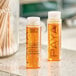 A group of small PAYA Papaya Conditioning Shampoo bottles on a counter.