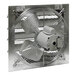 A large metal shutter-mounted exhaust fan with a round metal fan.