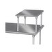 A silver rectangular Advance Tabco equipment shelf mounted on a table.