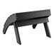 A black Lancaster Table & Seating Adirondack footrest with legs.