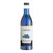 A bottle of Capora Blue Raspberry flavoring syrup with blue liquid inside.