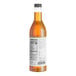 A bottle of Capora Mango Flavoring Syrup, 750 mL size.
