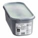 A white G.S. Gelato container of Mint Chocolaty Gelato with a lid.