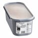 A white plastic container of G.S. Gelato Birthday Cake Gelato with a lid.