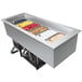 A Hatco drop-in refrigerated cold food well with two pans holding food on a counter.