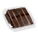 A square plastic container with a piece of David's Cookies Chocolate Overload Cake in it.