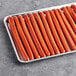 A tray of Sabrett 12" skinless beef franks.
