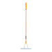A thatch rake with a hardwood handle and a yellow cushion end grip.