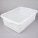 A white plastic Vollrath food storage container with a lid.