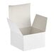 A white Baker's Lane bakery box with an open lid.
