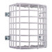 A white metal wire cage with metal corners on a white background.