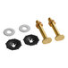 A toilet bowl wax gasket installation kit including two brass bolts with nuts, two metal washers, and two black plastic washers.