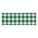 A white paper napkin band with a green gingham pattern.