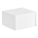 A white Baker's Lane cake box with a lid.