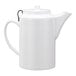 A white Service Ideas teapot with a handle and tethered lid.