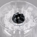 A clear plastic Proctor Silex blender with a black blade.