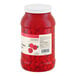 A large plastic jar of Hometown Provisions maraschino cherries without stems.