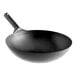 A large, heavy-duty oxidized carbon steel mandarin wok with a single handle.