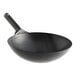 A black, heavy-duty oxidized carbon steel mandarin wok with a single handle.