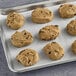 Sweet Loren's gluten-free chocolate chunk cookie on a white surface.