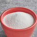 A case of McCormick Culinary Unseasoned Meat Tenderizer on a white surface.