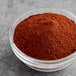 A bowl of McCormick Culinary Light Chili Powder.