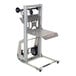 A silver and black Vestil portable aluminum load lifter with a metal frame.