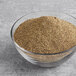 A bowl of brown powder, McCormick Culinary Pure Ground Black Pepper.